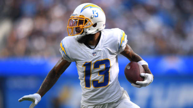 Sep 19, 2021; Inglewood, California, USA; Los Angeles Chargers wide receiver Keenan Allen (13) runs with the ball after a catch against the Dallas Cowboys during the second half at SoFi Stadium. Mandatory Credit: Orlando Ramirez-USA TODAY Sports